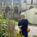 Cllr Sarah Quail and the weeds outside Chichester Cathedral