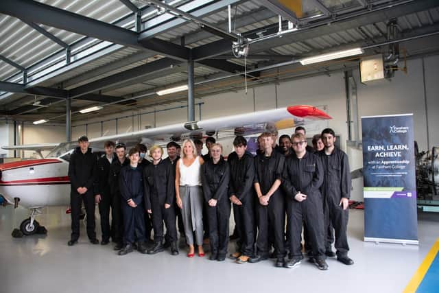 New aircraft unveiled at Fareham College
Caroline Dineage MP with Fareham College students who study Level 2 Diploma in Aerospace and Aviation Engineering and Level 3 Extended Diploma in Aeronautical Engineering at Fareham College’s CEMAST campus.