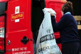 A general view of a Royal Mail worker collecting post. Picture: Rui Vieira/PA Wire