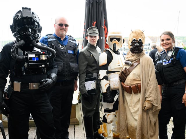 Pictured is: Star Wars Characters with two community support officers from Medina House, Hilsea and Connor Police StationPicture: Keith Woodland (080621-39)
