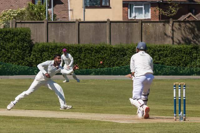 Havant bowler Richard Jerry in action against Weybridge. Picture: Mike Cooter