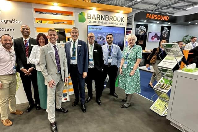 BARN IN THE USA: Some of the Barnbrook team on its stand at its record-breaking 2025 Farnborough International Airshow when they met visitors from major American companies