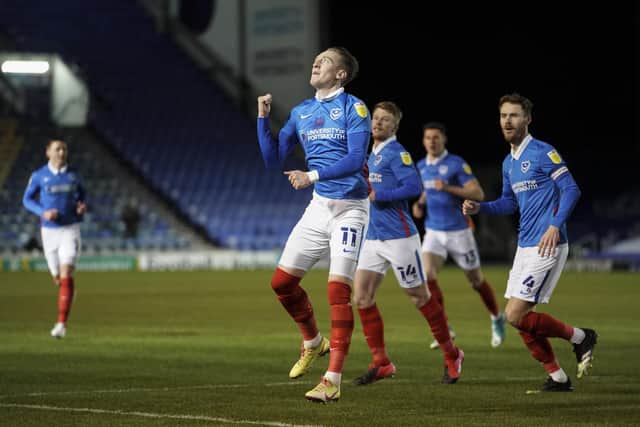 Ronan Curtis celebrates opening the scoring against Swindon. Picture: Jason Brown