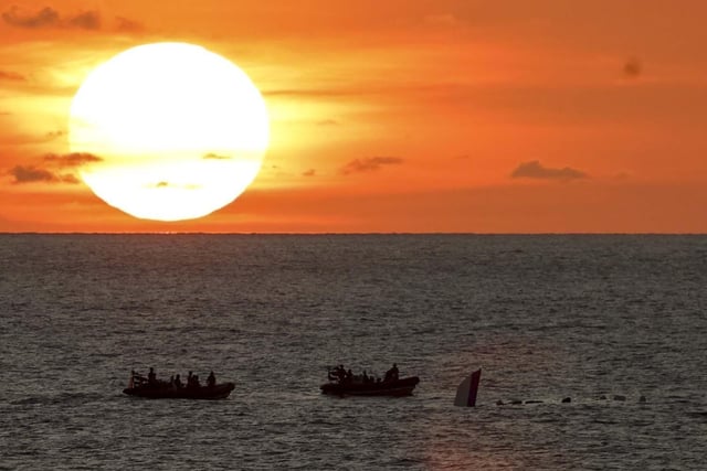 HMS Dauntless conducting a drugs intervention/rescue mission whilst operating in the Caribbean region.