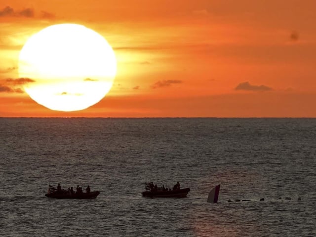 HMS Dauntless conducting a drugs intervention/rescue mission whilst operating in the Caribbean region.