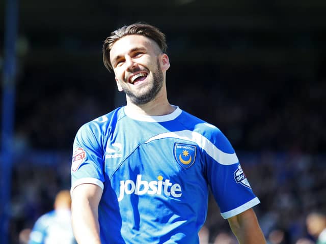 Ricky Holmes is all smiles during happier times at Fratton Park - a club he regrets leaving. Picture: Joe Pepler