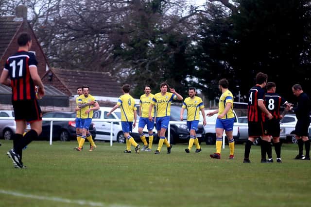 Locks Heath celebrate their L4 Teamwear Challenge Cup winner at Fleetlands earlier this month - last night they scored another 1-0 group win over the Coptermen to book their place in the knockout stages. Pic: Tom Phillips