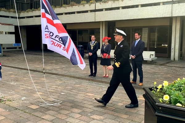 Portsmouth's Lord Mayor Cllr Rob Wood and naval base commander Commodore Jeremy Bailey took part in a flag raising ceremony today to mark the start of Armed Forces Week. Picture: Portsmouth City Council