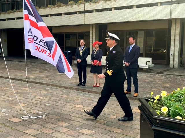Portsmouth's Lord Mayor Cllr Rob Wood and naval base commander Commodore Jeremy Bailey took part in a flag raising ceremony today to mark the start of Armed Forces Week. Picture: Portsmouth City Council
