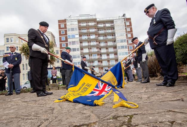 Royal British Legion standard bearers pay their respects at last year's memorial service  at the D-Day Stone in Southsea. With its links to the liberation of Europe, the city has been eyed as being added to a European walking trail. Picture: Habibur Rahman