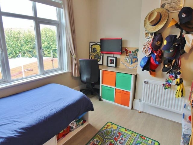 The listing says: "Ground floor accommodation boasts a 16ft reception room with log burner and feature fireplace, a 14ft dining room leading onto a modern fitted kitchen with quartz worktops, plus a downstairs WC."