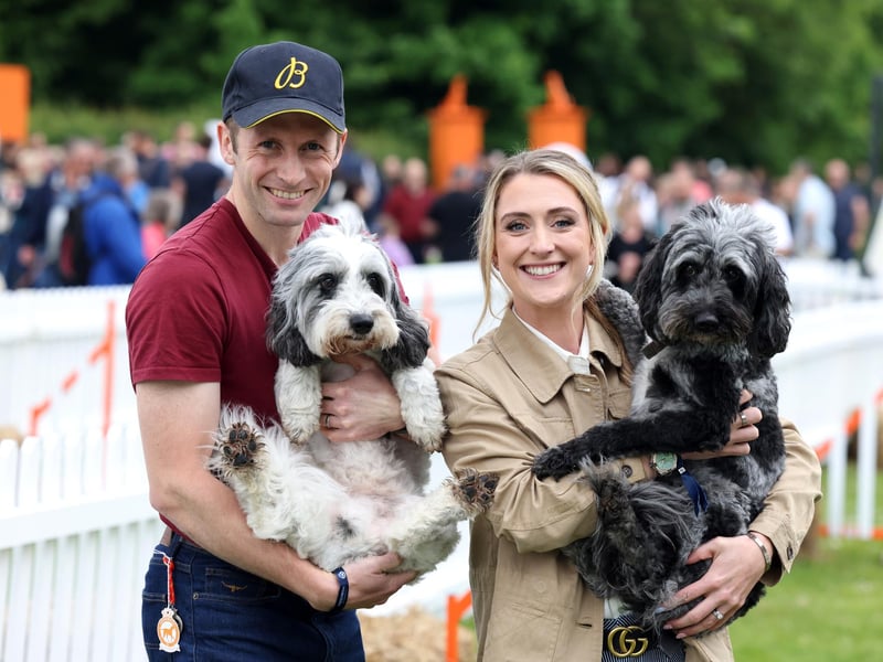 Sir Jason Kenny and Dame Laura Kenny at Goodwoof 2024, a dog event held at Goodwood Estate in Chichester. PA Photo. This year's event features a Labrador Parade, led by The Duke of Richmond, in celebration of the breed. Elsewhere at the event, visitors can try forest bathing, truffle hunting, watch top canine athletes in competition, enjoy wellness workshops and listen to talks from behavioural and veterinary experts. Picture credit should read: Matt Alexander/PA Media