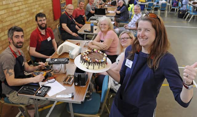 In happier times, the Portsmouth Repair Cafe celebrating its first birthday.
Founder Clare Seek leads the fun.
Picture: Ian Hargreaves  (200419-1)