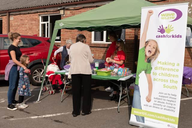 Customers at Grace's stall. Picture: Keith Woodland (260921-16)