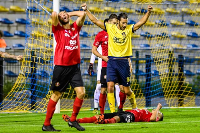 Christian Burgess celebrates his first and only goal of the season for Royale Union Saint-Gilloise, arriving against RFC Seraing in September 2020. Picture: LAURIE DIEFFEMBACQ/BELGA MAG/AFP via Getty Images
