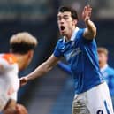 Pompey striker John Marquis appeals for a decision