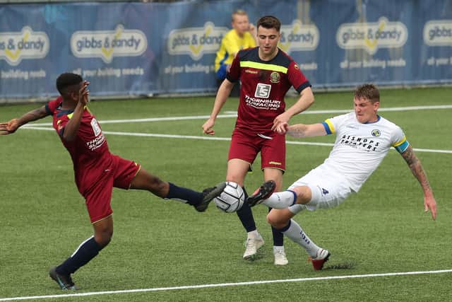 Hawks skipper Joe Oastler, right, with Chippenham's Mo Dabre in last weekend's losing National League South finale at Westleigh Park.
Picture by Dave Haines.