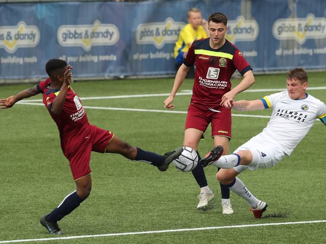 Hawks skipper Joe Oastler, right, with Chippenham's Mo Dabre  in last weekend's losing National League South finale at Westleigh Park.
Picture by Dave Haines.