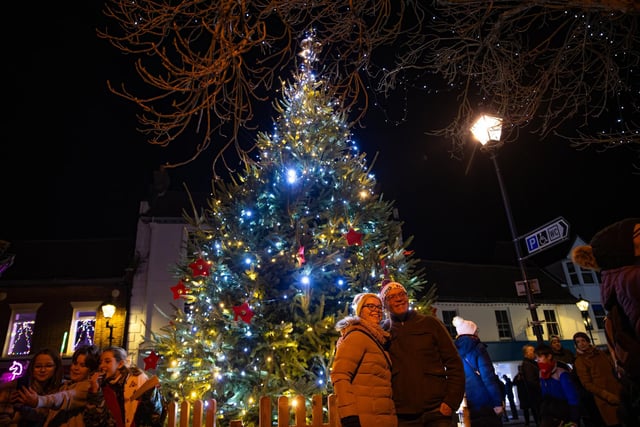 Crowds gathered in Emsworth Square to watch Santa Clause turn on the Christmas lights and hear local children sing festive songs on Friday, November 29.  Photos by Alex Shute