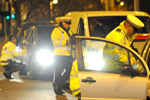 Hampshire police check drivers in Portsmouth in 2015. Picture Ian Hargreaves  (151954-20)