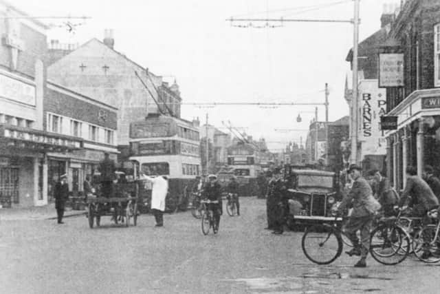 A busy scene in Commercial Road at the junction of Church Street (on the right). We now believe the date to be 1953.  Picture: The News archive