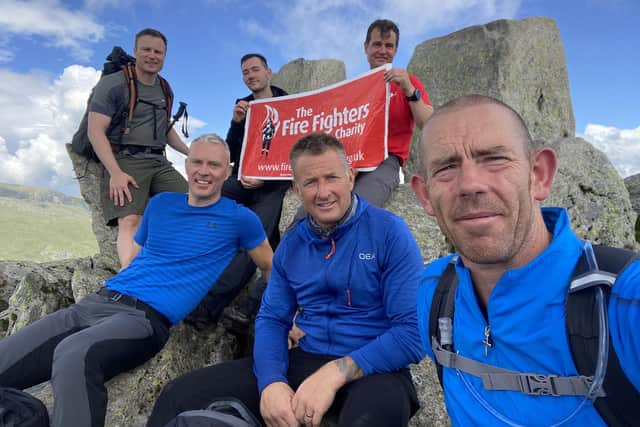 Firefighters from Southsea Fire Station completed the The Welsh 3000 challenge and raised over £1,000 for charity. The walkers were Simon Haswell, Gareth Smith, Paul Rogers, Steve Winter, Paul Marine and Josh Barnes. The support crew were Al Smith and Ben Taylor. Picture: Southsea Fire Station.