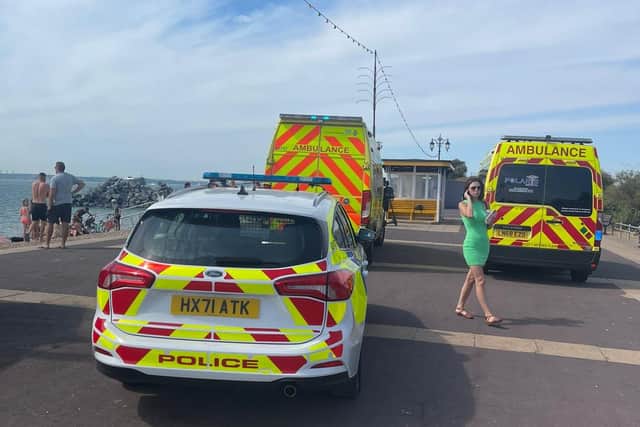 Emergency crews at Southsea Seafront near the Pyramids treating a seriously ill person.