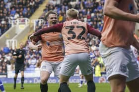 Terry Devlin celebrates his match-winner against Reading with team-mate Paddy Lane