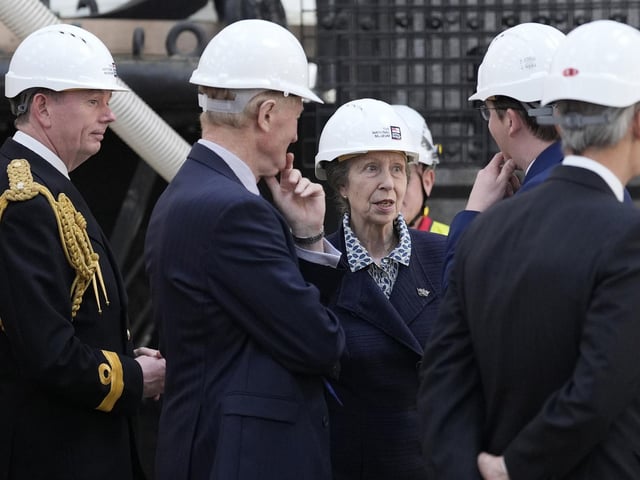 The Princess Royal (3rd right) during a visit to see the HMS Victory Conservation Project at the National Museum of the Royal Navy in Portsmouth Historic Dockyard.