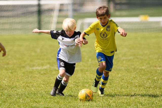 Action from the Clanfield youth football tournament at Horndean Technology College. Picture: Keith Woodland (270521-668)