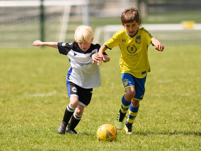 Action from the Clanfield youth football tournament at Horndean Technology College. Picture: Keith Woodland (270521-668)