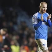 Connor Ogilive applauds the Fratton faithful after Thursday night's 2-2 draw with Ipswich