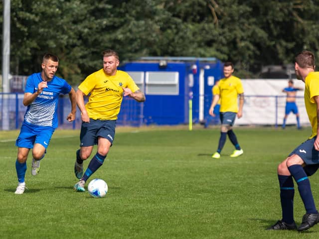 Milton Rovers 'Legends' player Aston Leigh gets away from his man. Picture: Mike Cooter (050921)