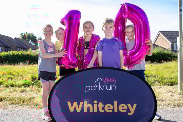 Skye Granger with her friends prior to her 100th parkrun at Whiteley. Picture by Alex Shute