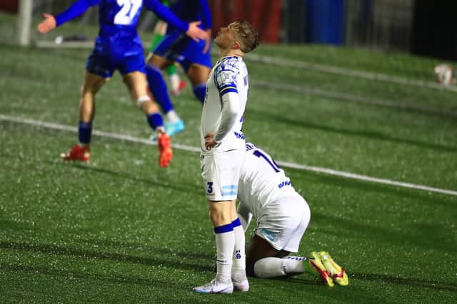 Hawks defender Joe Newton looks to the heavens after St Albans' second goal had deflected in off Tyrell Miller-Rodney. Picture by Dave Haines
