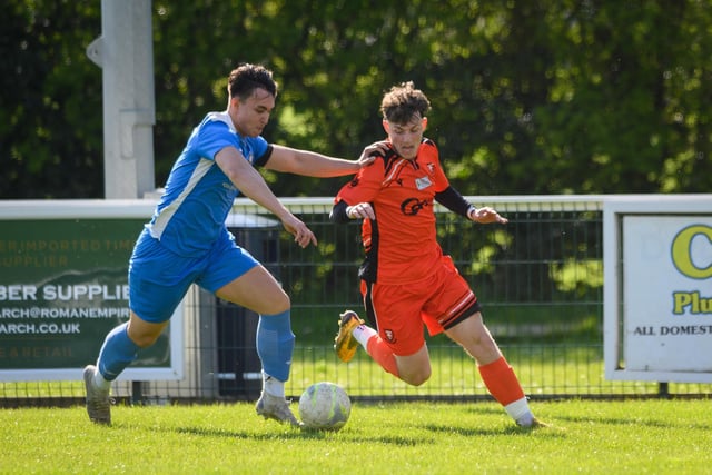 Action from the 2-2 draw between AFC Portchester under-23s (orange and black kit) and Liphook United. Picture: Keith Woodland (150421-936)