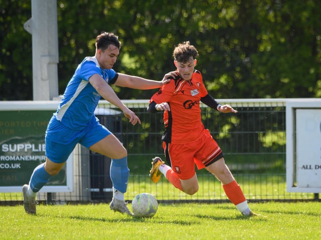 Action from the 2-2 draw between AFC Portchester under-23s (orange and black kit) and Liphook United. Picture: Keith Woodland (150421-936)