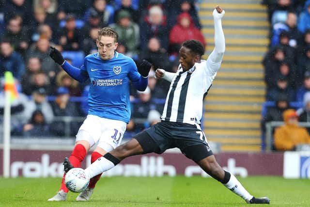 Pompey target Brandon Hanlan tangles with Ronan Curtis when the sides met at Fratton Park in October 2018. Picture: Joe Pepler/Digital South