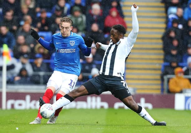 Pompey target Brandon Hanlan tangles with Ronan Curtis when the sides met at Fratton Park in October 2018. Picture: Joe Pepler/Digital South