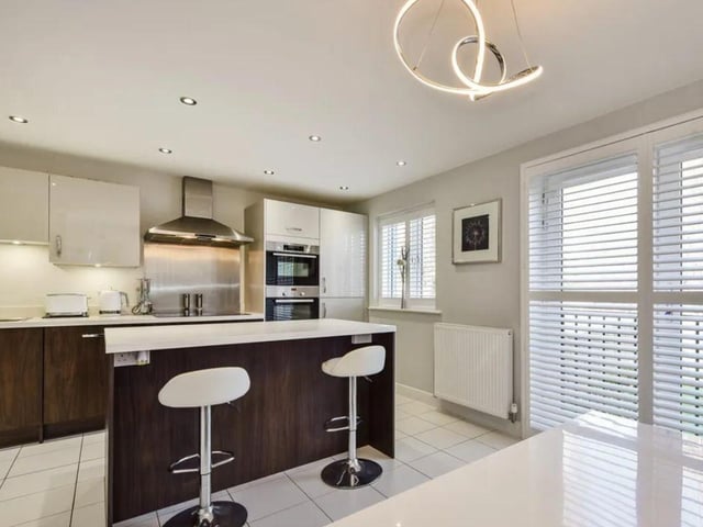 The listing says: "This immaculate property consists of three bedrooms, three bathrooms, an open plan kitchen diner and first floor sitting room with Juliet balcony."