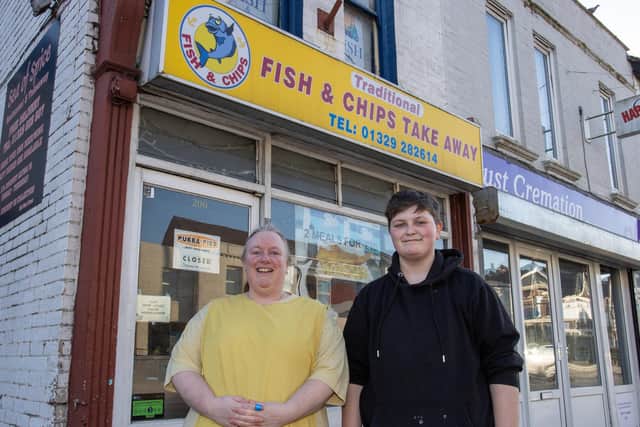 Rebecca Traynor who has run the Traditional Fish and Chip Shop for the past 14 years, with her staff member, Freyah Tyrrell, 22, is preparing to close the store for the final time on Sunday. Photo by Alex Shute