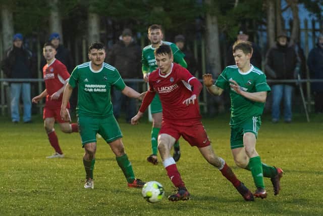 Horndean's Harry Jackson (red) missed a large chunk of last season with a knee injury. Picture: Vernon Nash