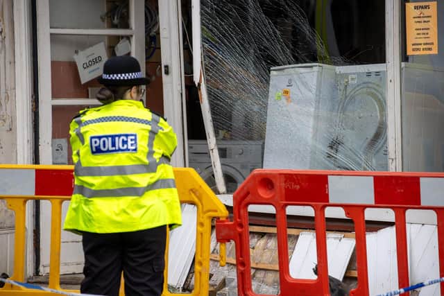 A police car has allegedly crashed into the front of a shop on Albert Road.

Pictured - The resulting damage and police on scene

Photos by Alex Shute