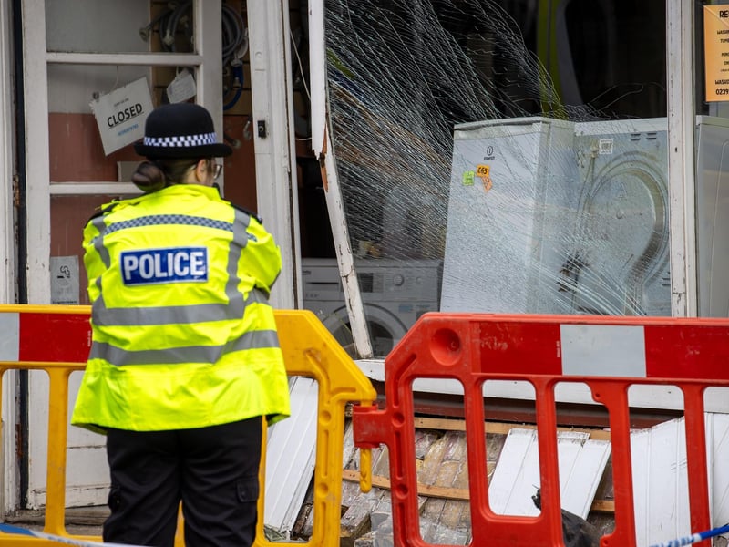 A police car has allegedly crashed into the front of a shop on Albert Road.Pictured - The resulting damage and police on scenePhotos by Alex Shute