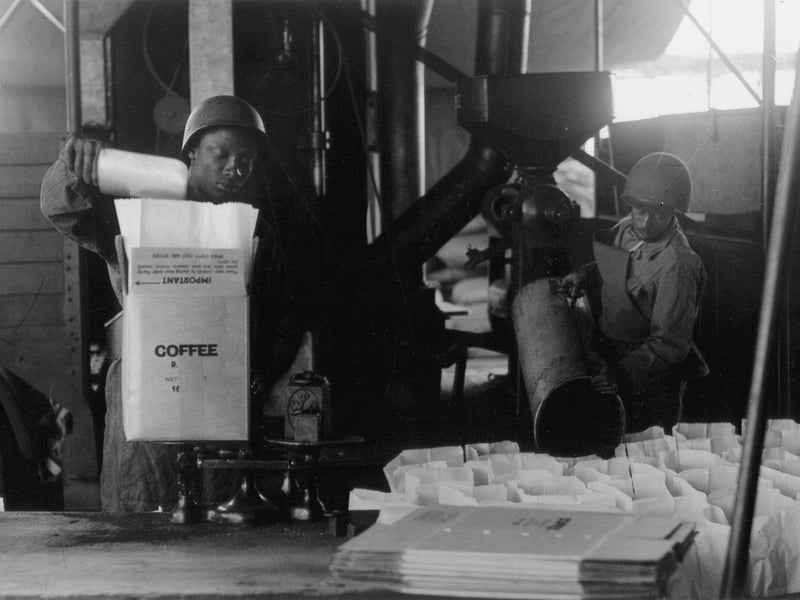 US soldiers preparing coffee, probably either at Hilsea or Cosham. The US Army was segregated, so African-American troops were in their own units rather than being mixed amongst white troops, and most were in logistical/support roles like this.