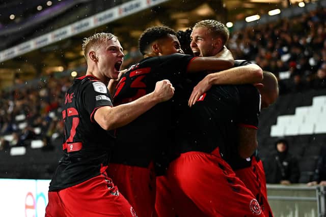 Paddy Lane (far left) was granted his Football League return by Fleetwood ahead of the 2021-22 season - and established himself as an impressive performer. Picture: Clive Mason/Getty Images
