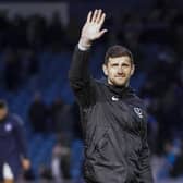 Head coach John Mousinho.