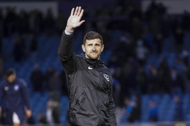 Head coach John Mousinho.