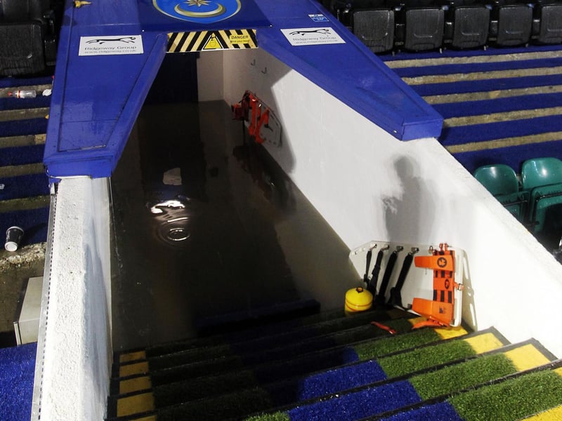 A monsoon hits Fratton in October 2013 for the clash with Wycombe. Frogmore Road is a torrent, the tunnel a lake and the pitch under water. Match abandoned.