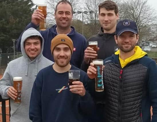 Chichester celebrating at their home club - captain Jimmy Marks, who was injured and couldn’t play, Joe Glover, Jimmy Marks (front), Nigel Jones, James Bird (back left), Charlie Guimaraeans
